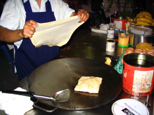 That's mine on the right, and she is laying a new crepe to eat. So simple, but so delicious