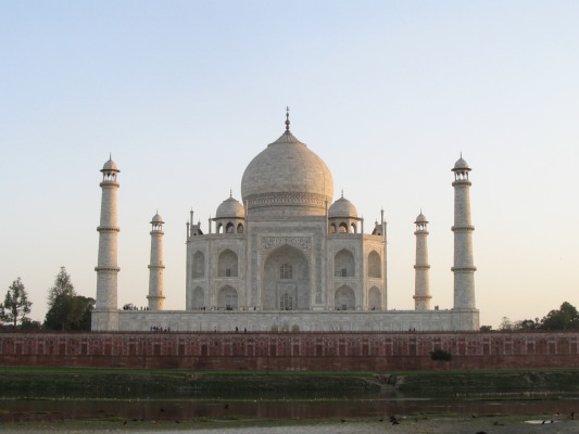 My first view of the Taj -- from across the river at sunset (this should be the first picture in this entry, but the site randomly changes the order of your pictures, they assure me they are changing it soon)
